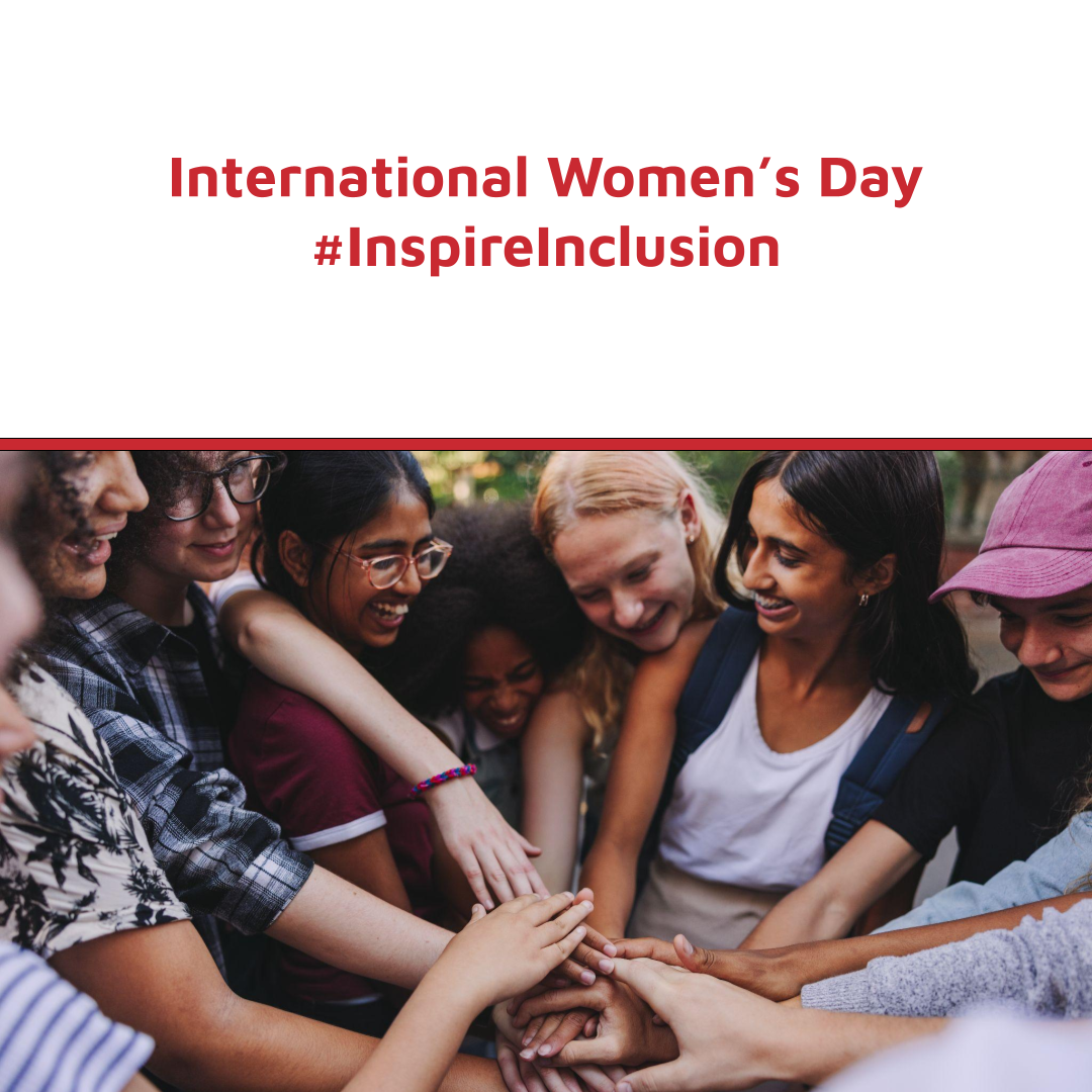 International Women's Day image of 5 smiling women of various races and ethnicities reaching their hands in toward each other in support Donate a Car Canada