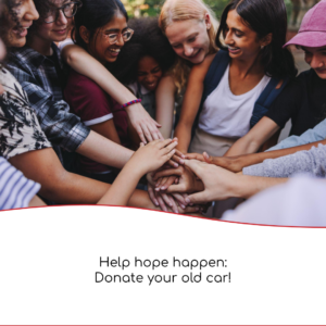 Donated Porsche Cayman raises huge donation for community service charity. Photo of a multi-race group of young people with their hands one atop another in a cheer-ready posture.